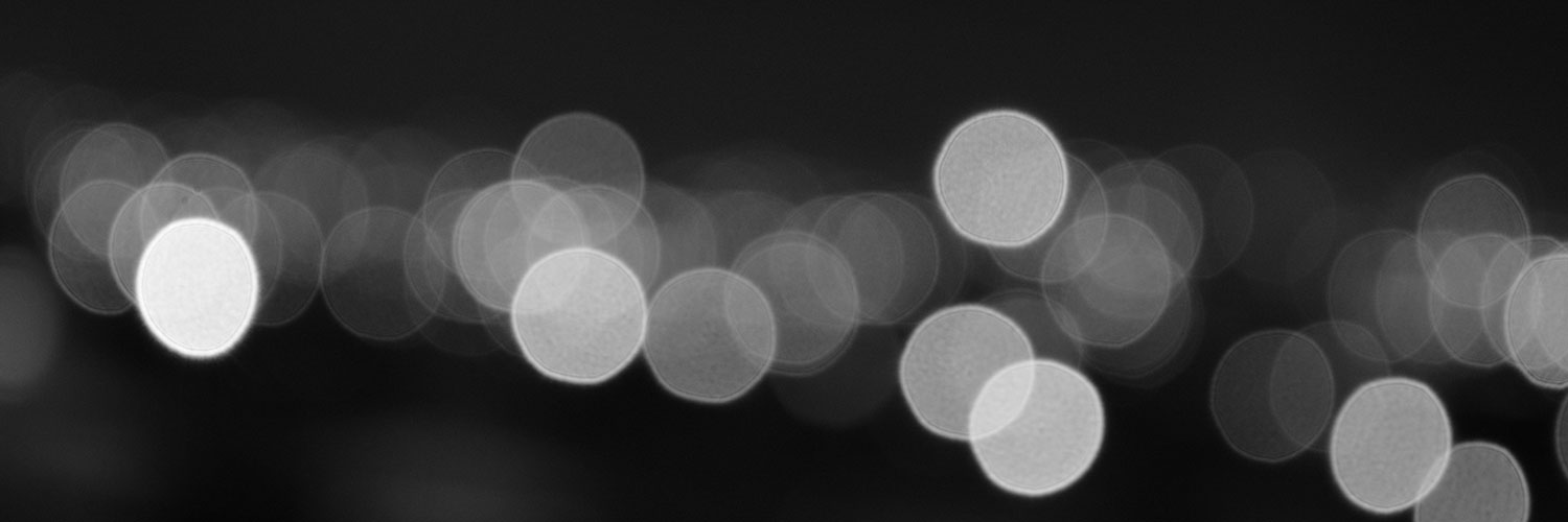 A black and white photo of some lights